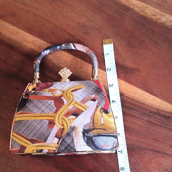 Classy Simon Chang Multicolor Handbag with Gold Accents. Great Condition. - Picture 7 of 11